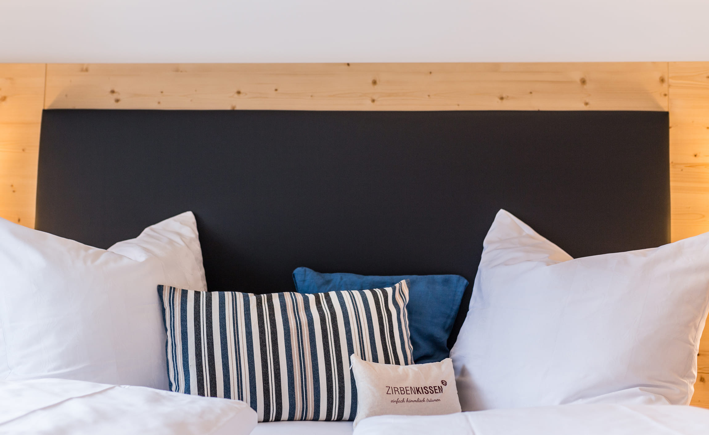 Close-up of pillows in a room at Hotel Botenwirt